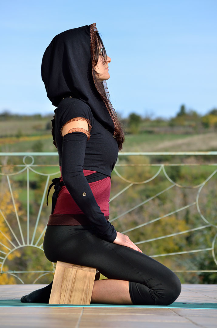 white wooden table with orange pumpkin on top